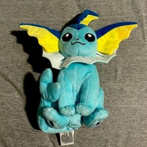 Vaporean and a poke ball plush..